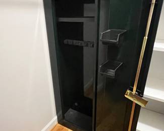 H121 - $75. Sentinel 8 Gun Security Cabinet. Model GCW-8. Key Lock Only. Measures 21" W x 10" D x 55" Tall.