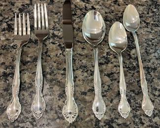 H95 - $75. 1960 Oneida Community "Affection" Pattern - Silver Plate. Service for 12 plus serving pieces.