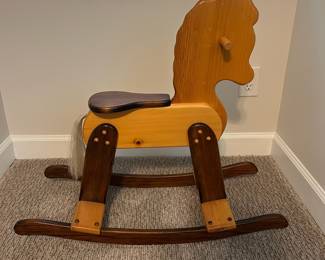 H65 - $30. Wooden Rocking Horse. Measures 13.25” W x 31” D x floor to seat 16.25 Tall.