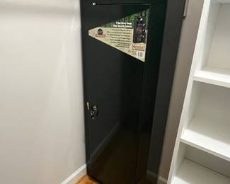 H121 - $75. Sentinel 8 Gun Security Cabinet. Model GCW-8. Key Lock Only. Measures 21" W x 10" D x 55" Tall.