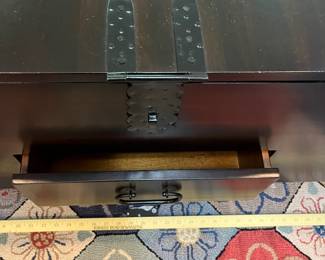 H49 - $95. Trunk Style Coffee Table - Dark Finish. Measures 44” W x 24” D x 18” Tall. Very good, Gently used condition.