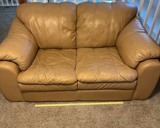 H59 - $150. Tan Leather Loveseat by Palliser Furniture "Shanelle Classic".Worn but no holes/rips. Measures 64” W x 36” D x floor to seat 18” x floor to back 30” Tall.