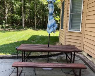 H11 - $75. Picnic Table with Umbrella. Measures 74” W x 60” D x 28.5” Tall. Fair condition - sturdy but a bit weathered.