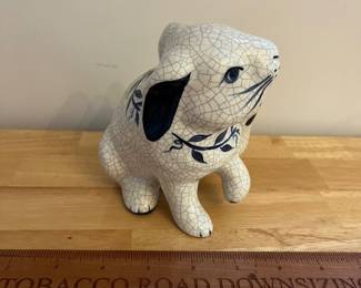 H135 - $45. Dedham Pottery Bunny. Measures 6.75" W x 5" Tall.