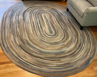 H22 - $225. Braided Rug. Measures 102” W x 132” Long. Lays perfect but it does have some "holes" where it should be sewn together. Would be easy to hand stitch back together if you wanted.