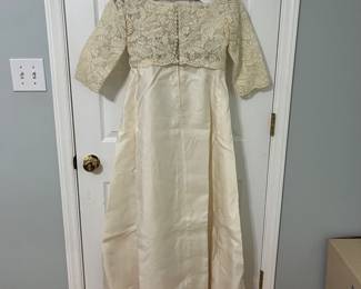 H101 - $100. Vintage Wedding Dress. Tag Reads "Specially Hand Made and Fashioned by Marian Bingaman."