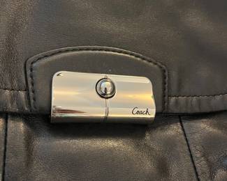 H92 - $55. Black Coach Kristin Hobo Purse. Outside shows some wear. Inside has some staining.
