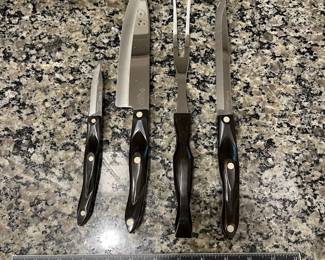 H69 - $80. Vintage Brown CUTCO Knife Set.
