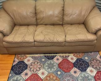 H51 - $175. Tan Leather Couch by Palliser Furniture "Shanelle Sofa Classic". Measures 88” W x 36“ D x floor to seat 17” x floor to back 32” Tall.