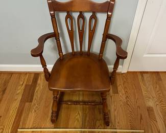 H33 - $30. Wood Arm Chair. Measures 23” W x 16” D x floor to seat 17” x floor to back 33” Tall. Sturdy and in very good condition.