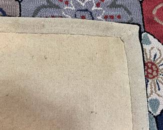 H50 - $95. Hooked Wool Rug. Measures 71” W x 109” Long.