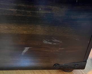 H49 - $95. Trunk Style Coffee Table - Dark Finish. Measures 44” W x 24” D x 18” Tall. Very good, Gently used condition.