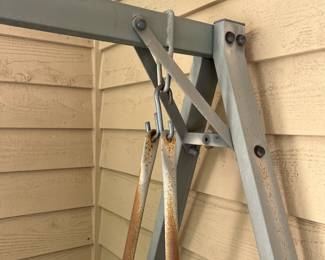 H9 - $60. Outdoor Swing. Measures 79” W x 55” D x 75” Tall. Has some surface rust but still sturdy! Please have a truck or trailer to move - we can not help disassemble.