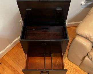 H48 - $75. Chest Style Side Table - Dark Finish. Measures 21” W x 23“ D x 24” Tall. Sturdy and very good condition.