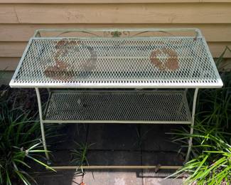 H13 - $75. Vintage metal Potting Table. Measures 37” W x 19.5” D x 32” Tall.