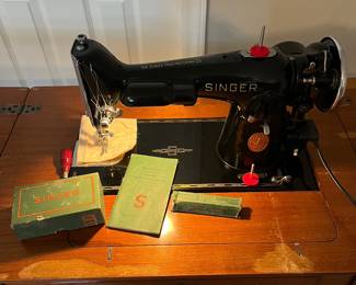H79 - $75. SINGER 201-2 Sewing Machine. Works. Table Measures 25.5” W x 17.75” D x 30.25” Tall.