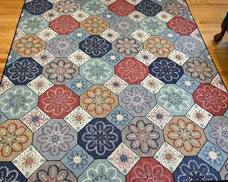 H50 - $95. Hooked Wool Rug. Measures 71” W x 109” Long.