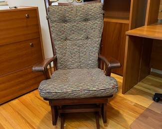 H38 - $75. Wooden Rocking Chair with Metal Accent. Measures 26.5” W x 36” D x floor to seat 18” x floor to back 44” Tall. Sturdy and very good condition.