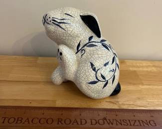 H135 - $45. Dedham Pottery Bunny. Measures 6.75" W x 5" Tall.