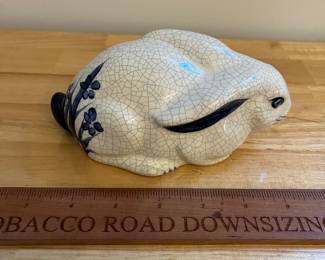 H130 - $20. Dedham pottery Bunny. Measures 6.5" W x 3.25" Tall.