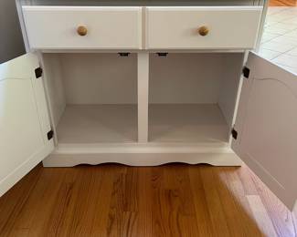 H57 - $60. White Cabinet. Single Drawer with Storage Cabinet below. Measures 38” W x 18” D x 31” Tall.