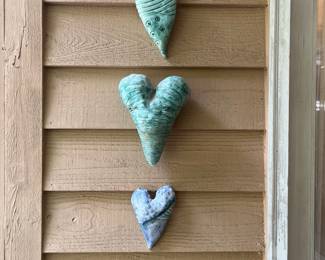 H15 - $25. Three-piece Pottery Heart Set.