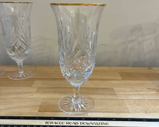 H86 - $80. 8 Piece Set. Miller Rogaska Gold Rim Iced tea Glasses. Measures 7.25" Tall. Minor wear on gold.