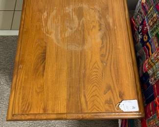 H64 - $20. Wood Side Table. Measures 20” W x 24” D x 21” Tall. Has some water rings, surface damage but still sturdy!