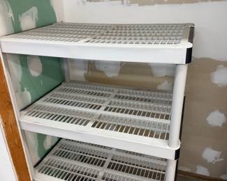 H111 - $30. Plastic 4 Shelf Unit. Measures 36" x 24" x 55.5" tall.