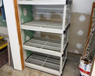 H111 - $30. Plastic 4 Shelf Unit. Measures 36" x 24" x 55.5" tall.
