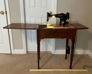 H79 - $75. SINGER 201-2 Sewing Machine. Works. Table Measures 25.5” W x 17.75” D x 30.25” Tall.