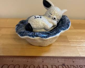 H134 - $40. Dedham Pottery Sleeping Bunny on Blue Cabbage. Measures 5.75" W x 3.5" Tall.