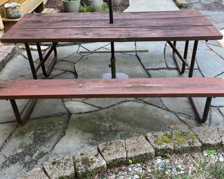 H11 - $75. Picnic Table with Umbrella. Measures 74” W x 60” D x 28.5” Tall. Fair condition - sturdy but a bit weathered.