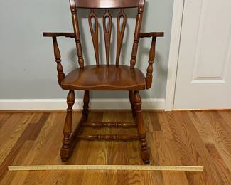 H33 - $30. Wood Arm Chair. Measures 23” W x 16” D x floor to seat 17” x floor to back 33” Tall. Sturdy and in very good condition.