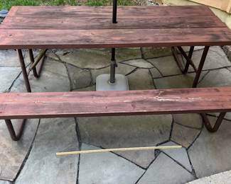 H11 - $75. Picnic Table with Umbrella. Measures 74” W x 60” D x 28.5” Tall. Fair condition - sturdy but a bit weathered.