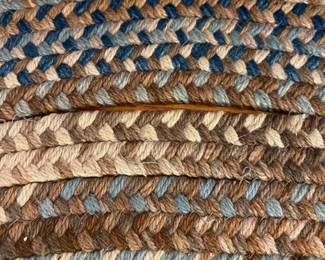 H22 - $225. Braided Rug. Measures 102” W x 132” Long. Lays perfect but it does have some "holes" where it should be sewn together. Would be easy to hand stitch back together if you wanted.