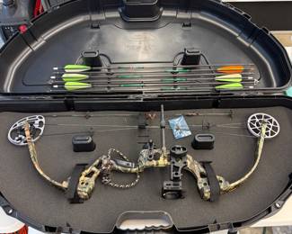 H115 - $200. 2008 Red Head Kronik Compound Bow with Case and Arrows. NEEDS to be restrung.