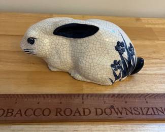 H130 - $20. Dedham pottery Bunny. Measures 6.5" W x 3.25" Tall.