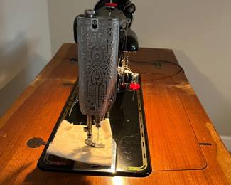H79 - $75. SINGER 201-2 Sewing Machine. Works. Table Measures 25.5” W x 17.75” D x 30.25” Tall.