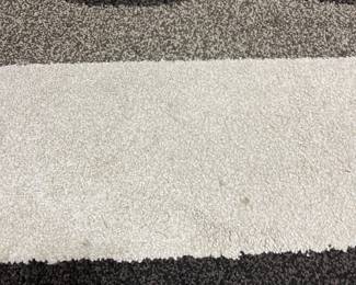 H82 - $35. Alfrombra Area Rug. Good condition with some spots. Measures 84” W x 120“ Long.