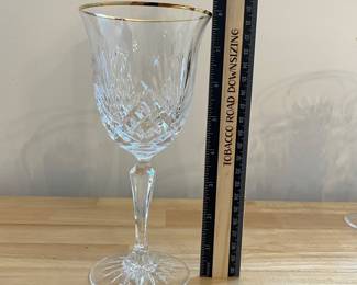 H87 - $80. 7 Piece Set. Miller Rogaska Gold Rim Water Goblets. Measures 8" Tall. Minor wear on gold.