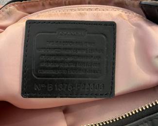 H92 - $55. Black Coach Kristin Hobo Purse. Outside shows some wear. Inside has some staining.