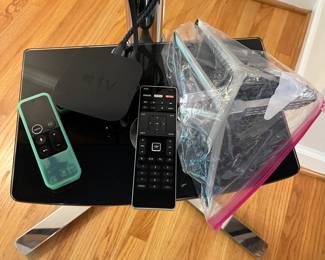 H24 - $120. 55” Vizio TV Model M55-C2 on Chrome Stand. TV on Stand Measures 59.5” Tall.