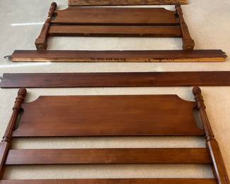 H74 - $60. Full Sized Wooden Bed Frame. Measures 56” W x 41” Tall. Includes side rails - no mattress/box spring.