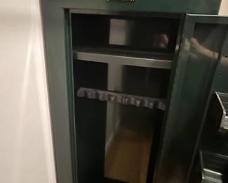 H121 - $75. Sentinel 8 Gun Security Cabinet. Model GCW-8. Key Lock Only. Measures 21" W x 10" D x 55" Tall.