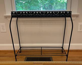 H2 - $15. Metal Plant Stand. Measures 25.5" W x 10.5" D x 23" Tall.