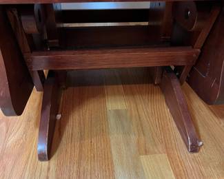 H38 - $75. Wooden Rocking Chair with Metal Accent. Measures 26.5” W x 36” D x floor to seat 18” x floor to back 44” Tall. Sturdy and very good condition.