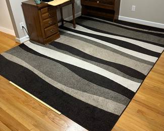 H82 - $35. Alfrombra Area Rug. Good condition with some spots. Measures 84” W x 120“ Long.
