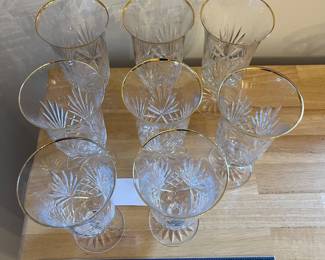 H86 - $80. 8 Piece Set. Miller Rogaska Gold Rim Iced tea Glasses. Measures 7.25" Tall. Minor wear on gold.