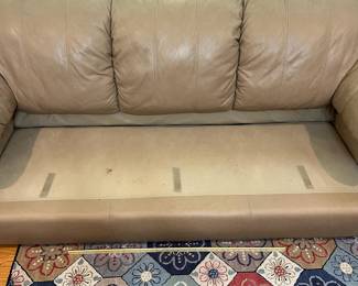 H51 - $175. Tan Leather Couch by Palliser Furniture "Shanelle Sofa Classic". Measures 88” W x 36“ D x floor to seat 17” x floor to back 32” Tall.